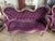 Matched pair of Victorian rococo revival sofas in a beautiful plum velvet. professionally restored and reupholstered. They...