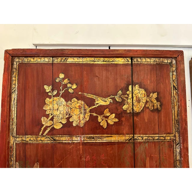 Stunning pair of distressed antique Chinese hand painted wooden panels having red backgrounds and figural decoration of...