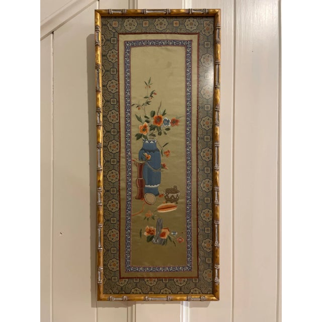 A long tall beautiful rectangular framed Chinese silk tapestry. A lovely addition to any wall. This tapestry portion of...