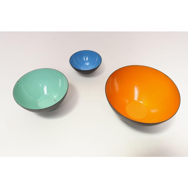 Set of three snack bowls designed by Herbert Krenchel for Krenit (ca. 1970s, Denmark). Black metal with blue, mint green,...