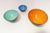 Set of three snack bowls designed by Herbert Krenchel for Krenit (ca. 1970s, Denmark). Black metal with blue, mint green,...