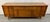 Bring iconic mid-century style into your home with this beautifully designed walnut credenza by renowned designer Leo...