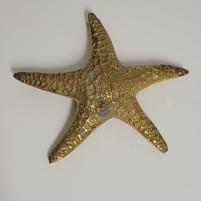 A striking mid-century solid brass starfish with beautifully detailed texture and sculptural form. Measuring approximately...