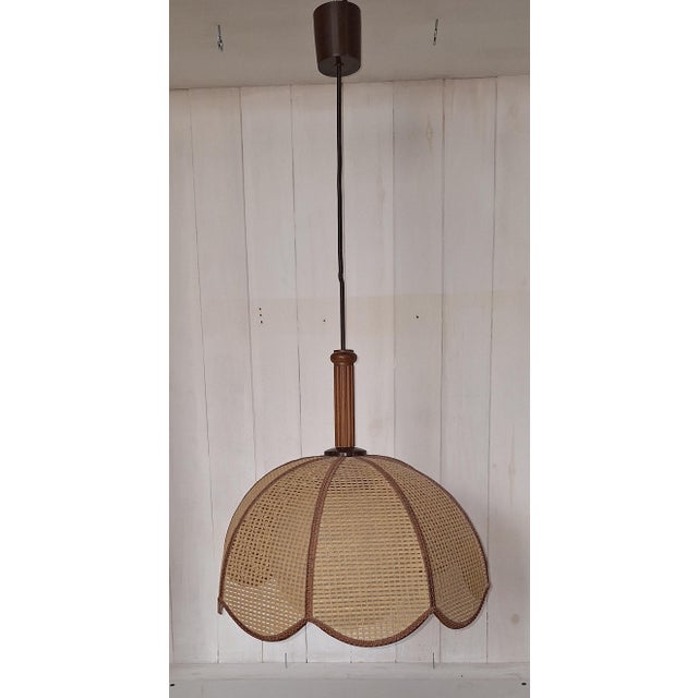 Vintage Pendant Lamp with Brown Plastic and Beechwood Mounting by Linus Bopp, 1980s, in Very Good conditions. Designed...