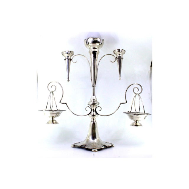 Silver Candelabra with Glass Containers and Cut-Outs, in Very Good conditions. Designed 1890 to 1919 This piece has an...