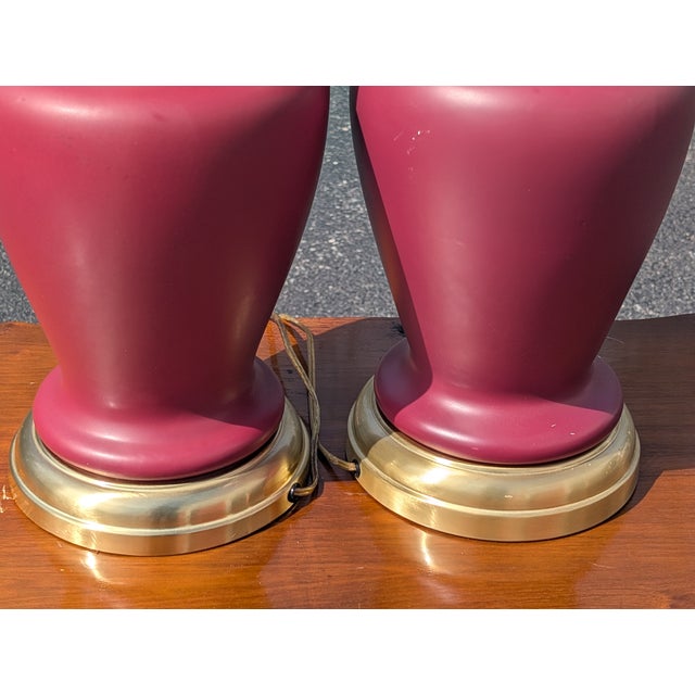 Add a bold pop of color and vintage glamour to your interior with this striking pair of late 20th-century Hollywood...