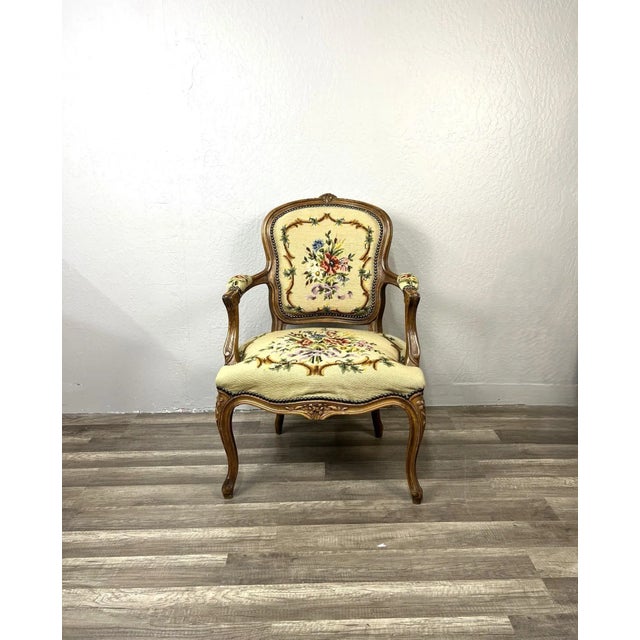 This beautiful mid-century copy of a Louis XV style chair offers a bit a nostalgia and the sturdiness of a newer chair....