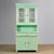 Large pine buffet cabinet from circa 1930 in its original paint. The cabinet consists of two separate sections. The upper...