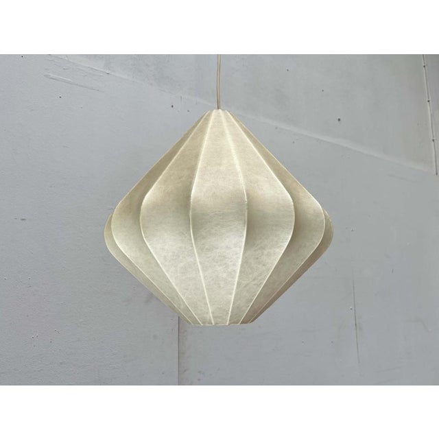 Mid-Century Modern Cocoon pendant lamp by Goldkant Leuchten, designed by Friedel Wauer in the 1960s. A minimalist design,...