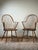 A handsome pair of signed L.E. Partridge Connecticut bench-made continuous-arm Windsor chairs dating to circa 1960s,...