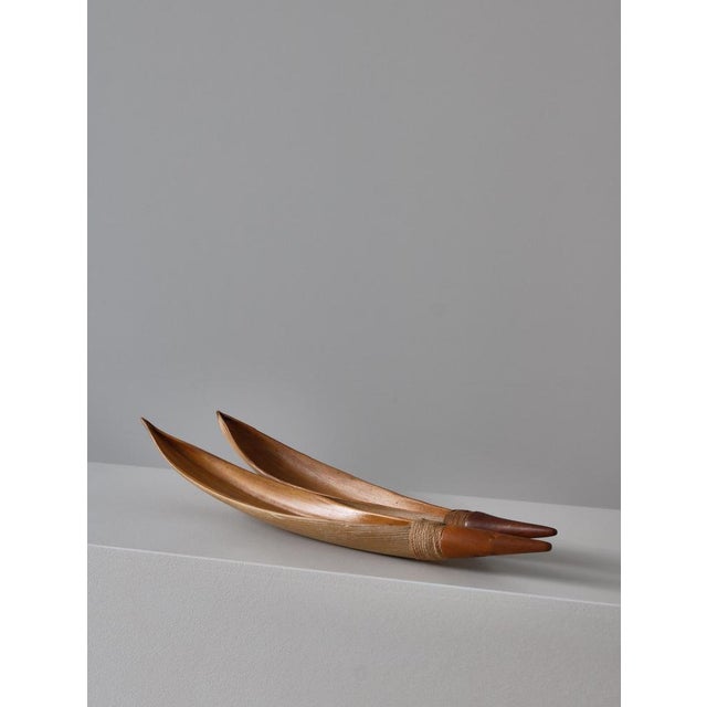 A pair of charming and decorative serving bowls made of palm tree pods manufactured in the 1950s at the famous retailer...