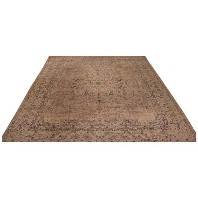 ACTUAL SIZE: 9’0″ x 13’0″ PRIMARY COLOR: Tan / Ivory AGE: Antique ORIGIN: Turkey MATERIALS: Wool FOUNDATION: Cotton...