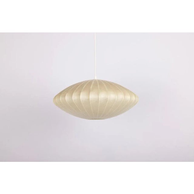Rare Mid-Century Modern Cocoon Pendant Light by Goldkant Leuchten, Germany, 1960s An exceptional example of mid-century...