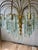 A spectacular monumental Italian Modernist chandelier dating to the 1970s, featuring an architectural polished-brass...