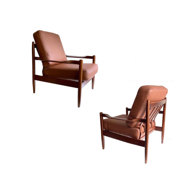 Pair of Vintage Danish modern lounge chairs attributed to Magnus Olesen featuring louvered organic-shaped backrests,...