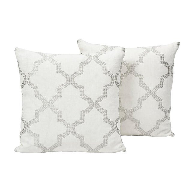 This pillow features Tangier Embroidery with a Knife Edge finish. Mod meets Moroccan in this geometric pattern. A fretwork...