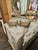 The product is a pair of French Louis XVI giltwood ottomans. These stylish and elegant pieces of furniture add a touch of...