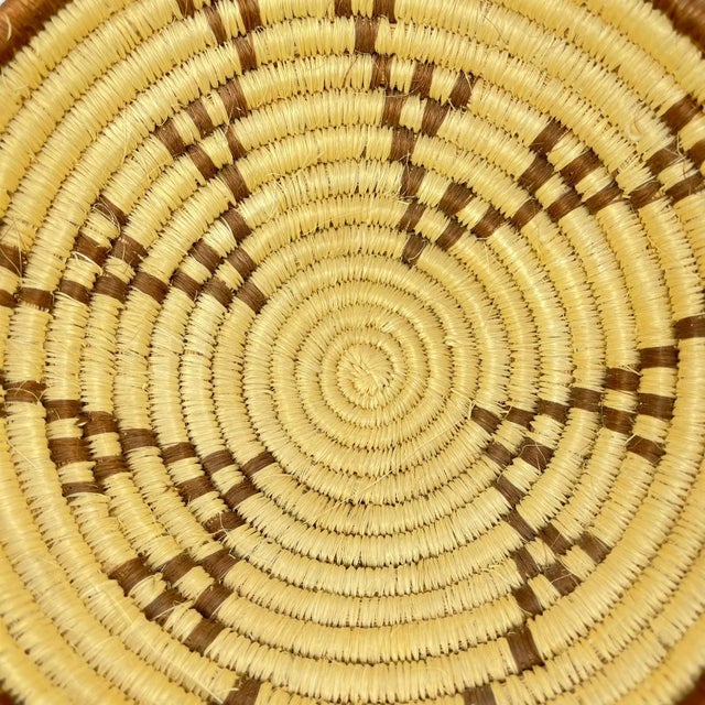 Basket handmade by the Zulu People in KwaZulu-Natal, South Africa. The Zulus are the largest tribe in Southern Africa,...