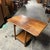 A beautifully figured 1960s drop-leaf coffee table with burr walnut veneer, contrasting oak construction and a practical...