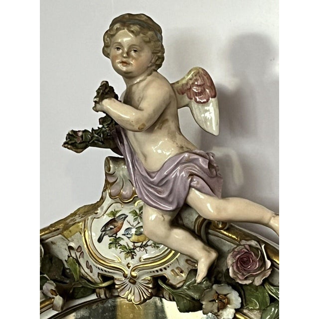 Antique Meissen or Continental German Porcelain Wall Mirror Set. Decorated with Cherubs & Birds. The main mirror in...