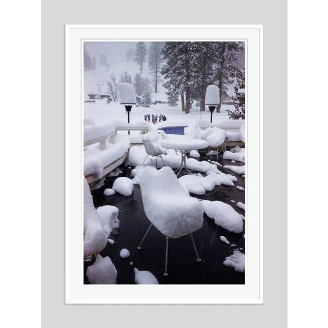 Squaw Valley Snow' by Slim Aarons Open Edition Snow covers the deserted cafe in Squaw Valley, California, January 1961....