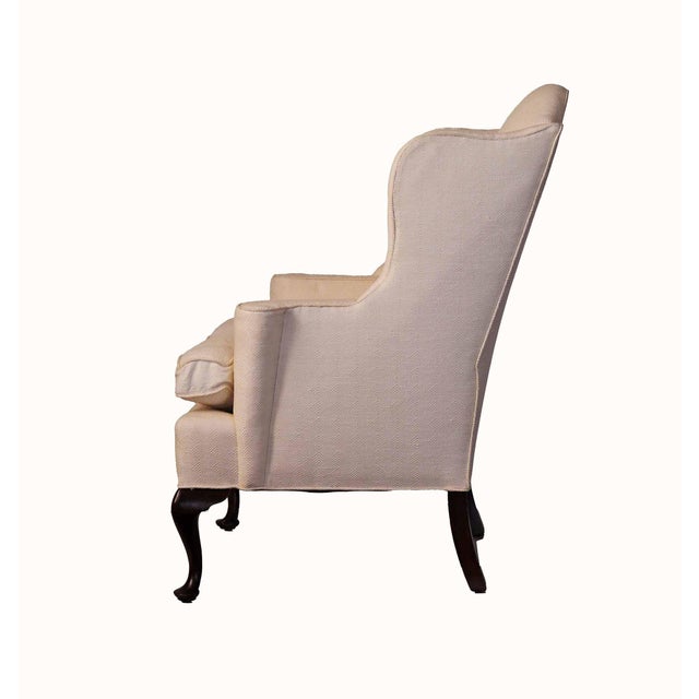 Vintage three quarter size wingback armchair. Upholstered in an off white soft textured material.