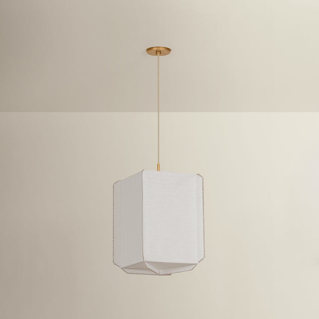 Louise celebrates the beauty of handcrafted materials through a soft yet structured silhouette. Made from delicate...