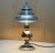 This is a sublime pair of small side table lamps, chromed metal, made by tucker & edgar ltd london, designed by miss elsie...