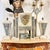 French Art Deco period mantel clock and obelisks garniture (set), circa 1920s, crafted from onyx stone with champleve...