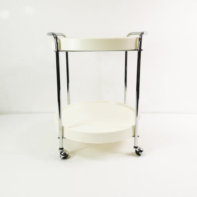 This bar originated in Germany in the 1960s. It features a spacious, modernist form. Chrome metal construction with...