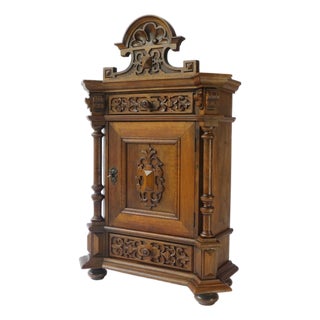 Antique German Carved Wooden Apothecary Cabinet with Floral Details, 1900s For Sale