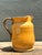 Embrace the rustic elegance of the Mediterranean with this stunning vintage Italian ceramic pitcher. Hand-crafted with a...