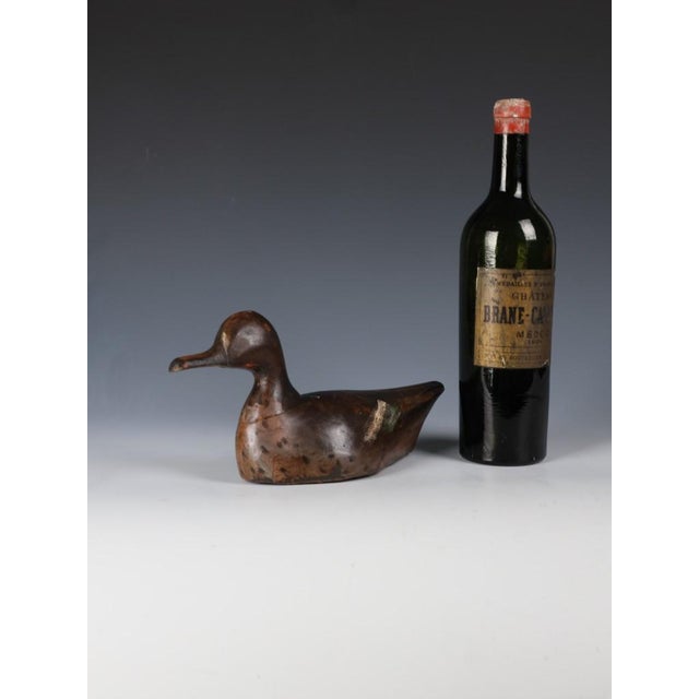 Early Hand-Carved Wooden Duck Decoy – Folk Art Hunting Decoy, Early 20th Century Beautifully hand-carved with an abundance...