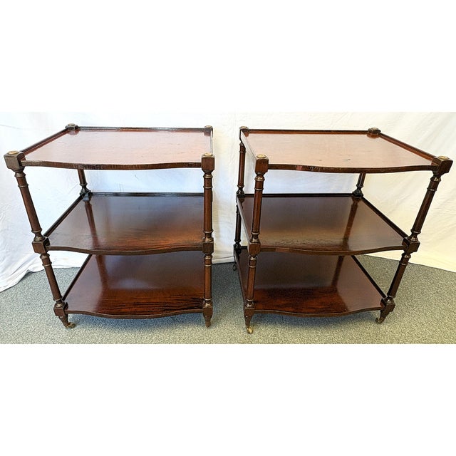 Useful pair of vintage Regency style library side tables from the mid 20th century. Each is made of wood with three...