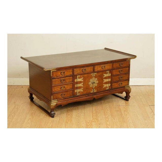 Antiques of London are delighted to offer for sale this beautiful late 19th-century Korean elm coffee table with lots of...