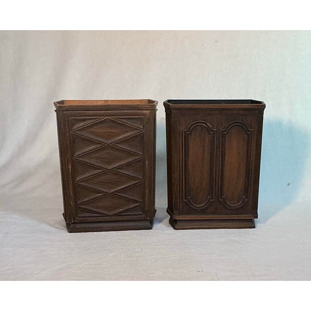 Vintage pair (set) of Mid Century Modern 1960s Pearl-Wick wastebaskets. Features heavy hard molded plastic with a carved...