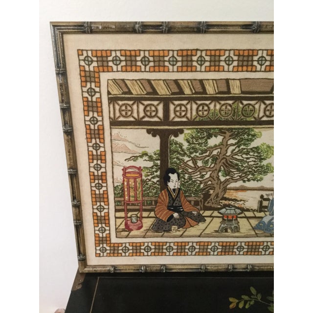A vintage hand embroidered asian scene with a nice faux bamboo frame, made in the 1980's in great vintage condition