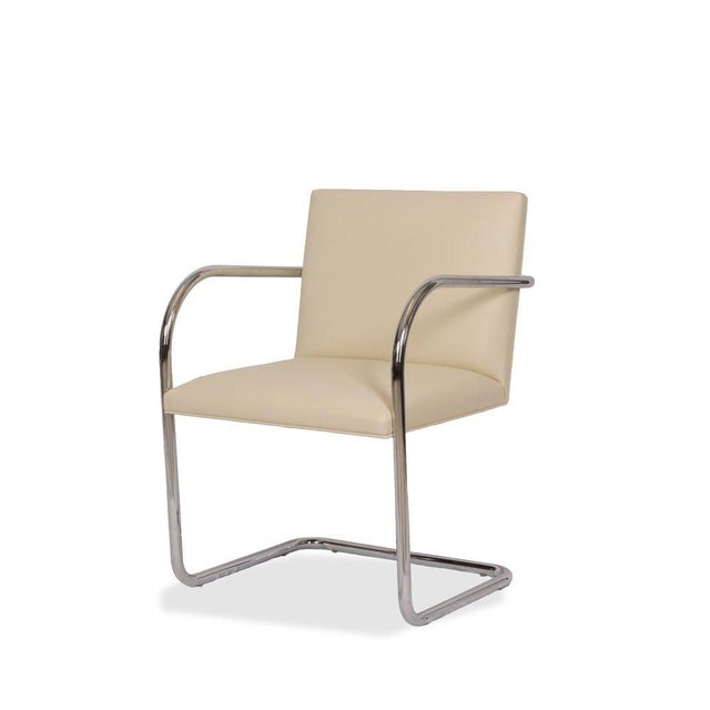 An icon of modernist design, the Knoll Mies van der Rohe Brno chair embodies sleek sophistication with its cantilevered...