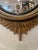 This is a handsome neoclassical convex “bull’s-eye” mirror, most closely associated with the English Regency period and...