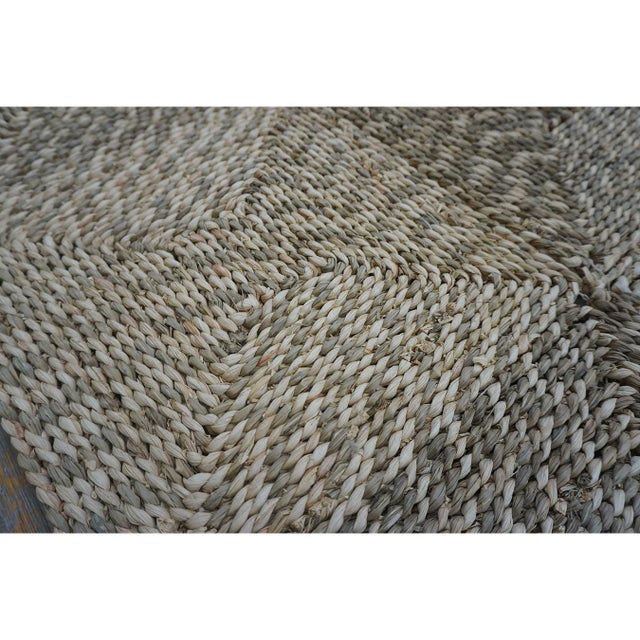 This circa 1940 Moroccan rug exemplifies the celebrated, rustic textile traditions of the North African Atlas Mountain...