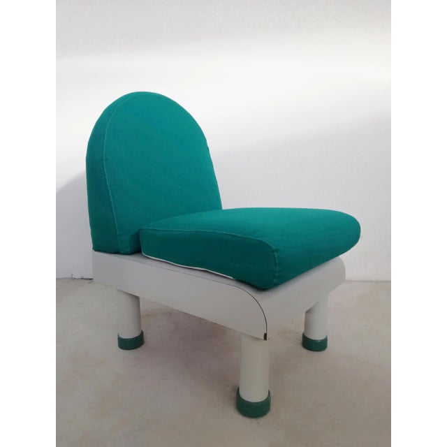 Modular sofa with a fully 80's style composed of 4 small armchairs in white laminate and dark aqua green removable fabric....