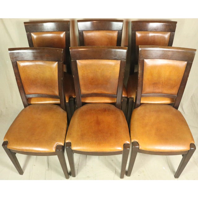 A set of six French leather dining chairs daiting form the middle of the 20th century. They are in excellent as found...