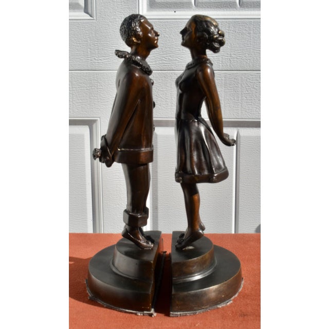 Vintage (1980's) Bookends have a French Art Deco Style. Made of Bronze. Man & Woman Flirt Lovers - Pierrot Pierrette. The...