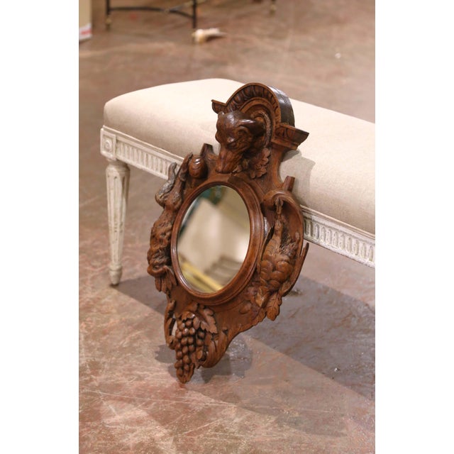 Decorate a study or hallway with this heavily carved antique mirror. Created in France circa 1880 and measuring just over...
