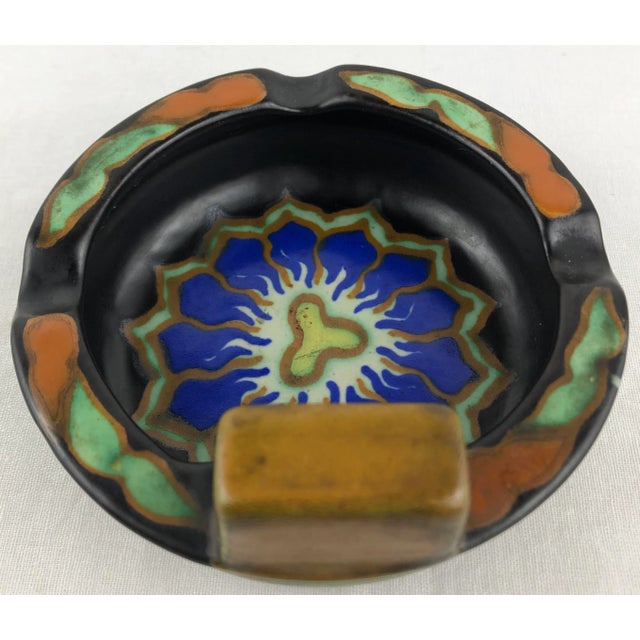A beautiful Art Nouveau Gouda pottery ashtray. Wonderfully colorful floral hand painted design, from Holland. This well...