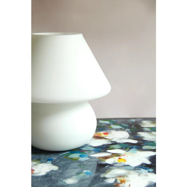 Calla is a smooth mushroom lamp finely realised by skilled glass blowers in Murano, Venezia in the early 80s. She features...