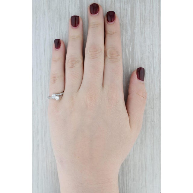 Gemstone Information: - Natural Diamonds - center Total Carats - 0.50ctw Cut - Round Brilliant Color - H - I Clarity - SI2...