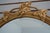 Glass Friedman Brothers Ornate Gold Frame Oval Wall Mirror For Sale - Image 7 of 10