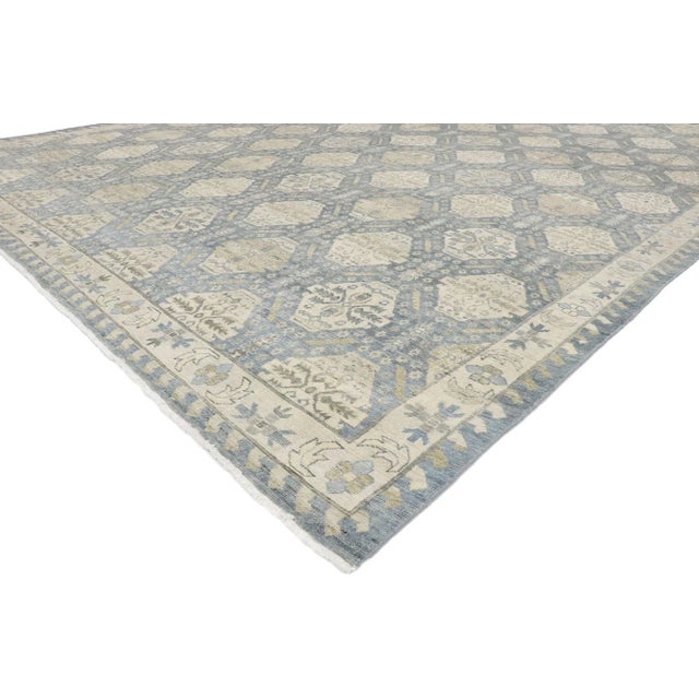 Vintage Soft Blue Distressed Rug, 9'10 x 13'01. Blending elements from the modern world with a tranquil color palette,...