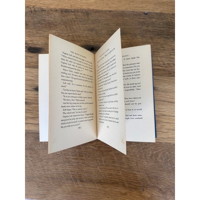 First edition John Steinbeck 1942 The Moon is Down Silver gilt text on spine. 7.5" x 5" x .75 188 numbered pages. Good...